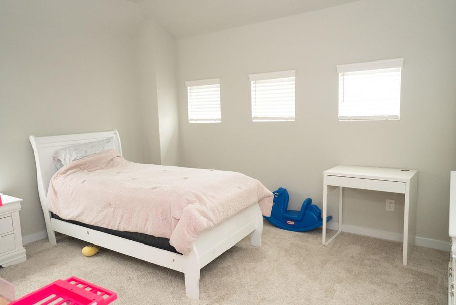 Furnished interior view inside a new home in Sunterra, Katy (Image 5).