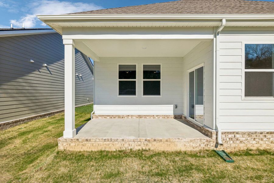 Exterior details and patio area of a home in Cedars of Cane Ridge | 55+ Community, Antioch (Image 4).