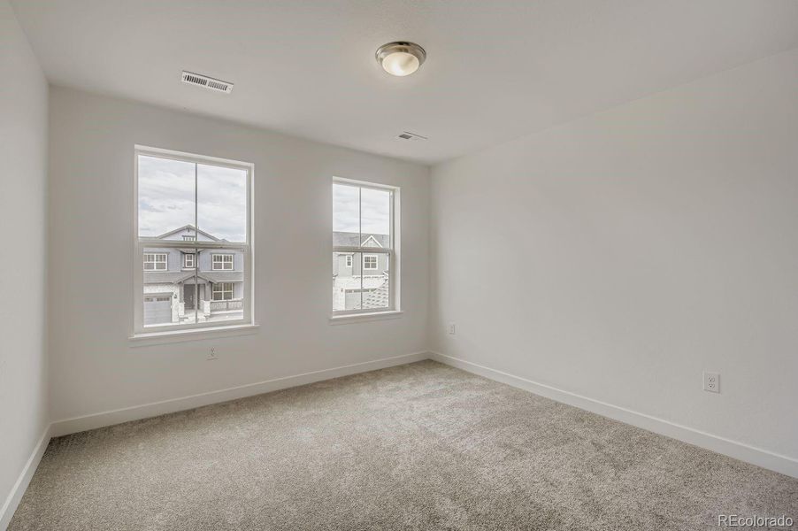 Spacious, unfurnished interior of a new home in Riano Ridge: The Grand Collection, Loveland (Image 13). Spacious, unfurnished interior of a new home in Riano Ridge: The Grand Collection, Loveland (Image 13).