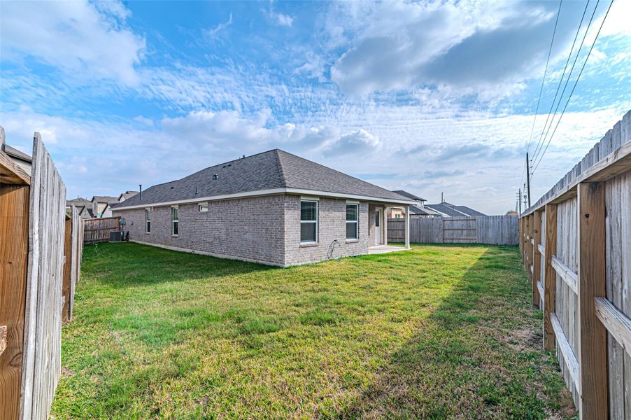 Exterior details and patio area of a home in Marvida, Cypress (Image 4).
