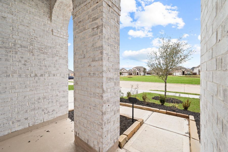 Exterior details and patio area of a home in Brookewater, Rosenberg (Image 32).