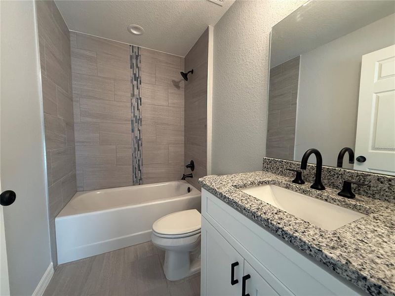 Furnished interior view inside a new home in , Dunnellon (Image 4).