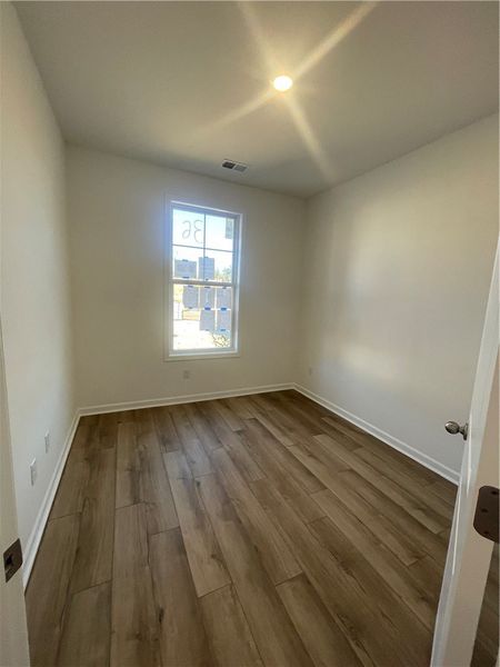 Spacious, unfurnished interior of a new home in Springwood Grove, Central (Image 15).