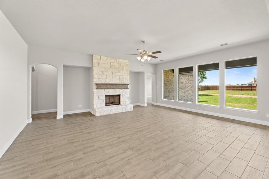 Family Room | Concept 2796 at Coyote Crossing in Godley, TX by Landsea Homes