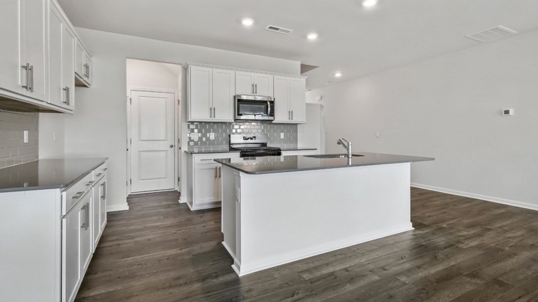 Furnished interior view inside a new home in Chapel Townes, Raleigh (Image 6). Furnished interior view inside a new home in Chapel Townes, Raleigh (Image 6).