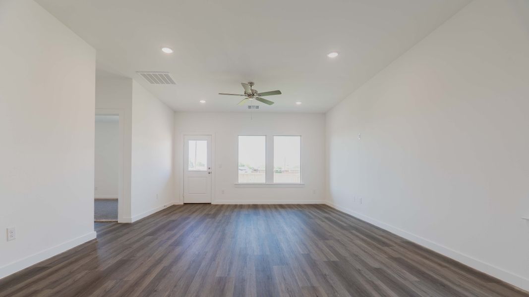 Representative unfurnished interior of a home built from the The Kendall by D.R. Horton in Overlook West, Wolfforth (Image 8).