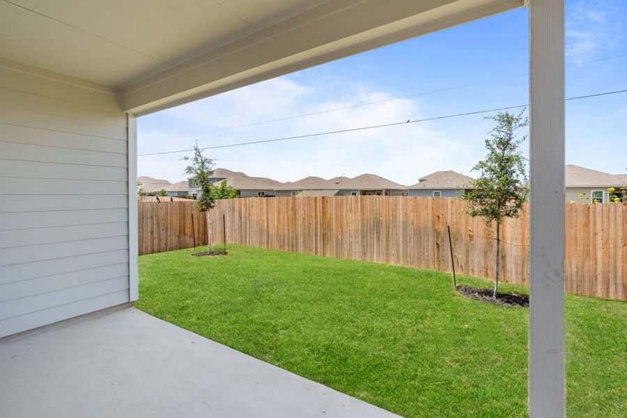 Exterior details and patio area of a home in Talley Fields, San Antonio (Image 3).