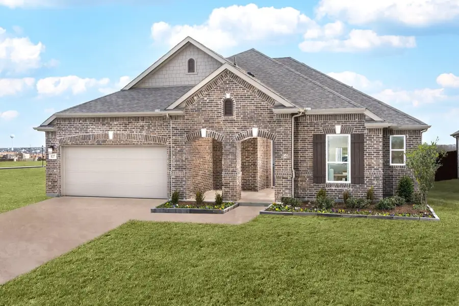 Front exterior of a new home in The Preserve Estates, Justin, TX, highlighting curb appeal (Image 1). Front exterior of a new home in The Preserve Estates, Justin, TX, highlighting curb appeal (Image 1).