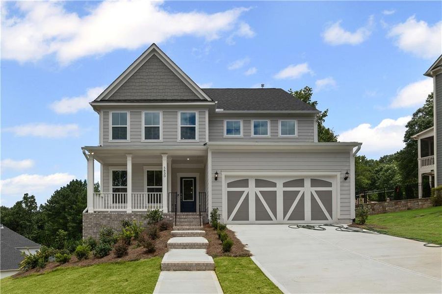 Front exterior of a new home in Reunion, Hoschton, GA, highlighting curb appeal (Image 22).