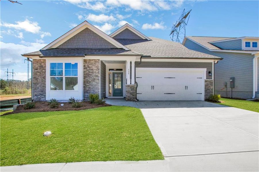 Front exterior of a new home in Marble Tree, Ball Ground, GA, highlighting curb appeal (Image 2). Front exterior of a new home in Marble Tree, Ball Ground, GA, highlighting curb appeal (Image 2).