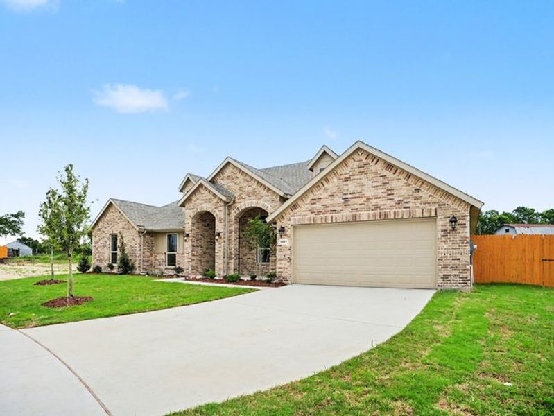Front exterior of a new home in Cole Crossing Estates, DeSoto, TX, highlighting curb appeal (Image 18). Front exterior of a new home in Cole Crossing Estates, DeSoto, TX, highlighting curb appeal (Image 18).