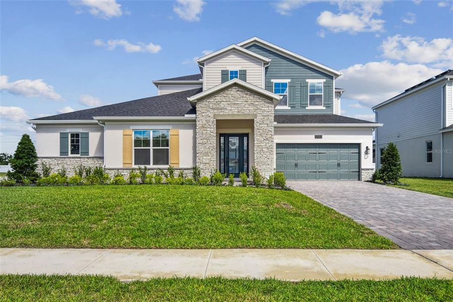 Exterior details and patio area of a home in Solace at Corner Lake, Orlando (Image 33).