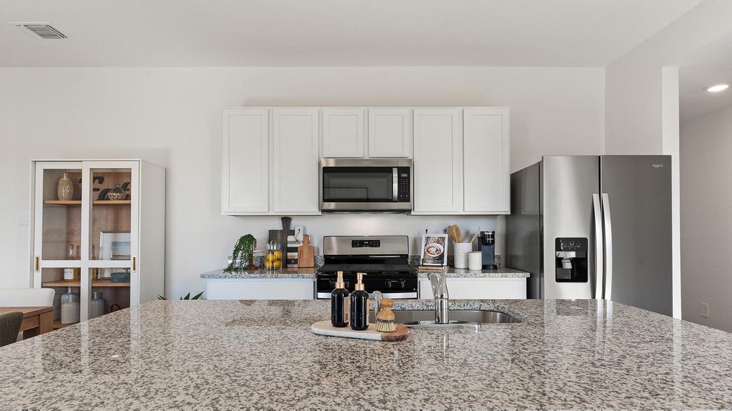 Furnished interior view inside a new home in Watermill, Uhland (Image 13). Furnished interior view inside a new home in Watermill, Uhland (Image 13).