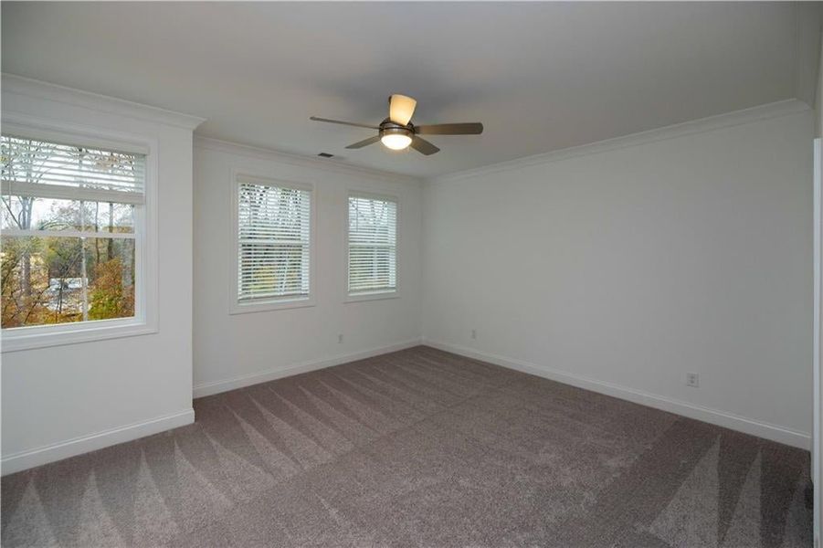 Owners bedroom is a very generous size, blinds are not included in home. Pictures represent a previously built home not the actual home, home is under construction.