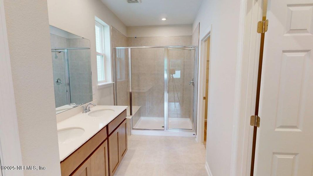 Furnished interior view inside a new home in Sandridge Hills, Green Cove Springs (Image 2).
