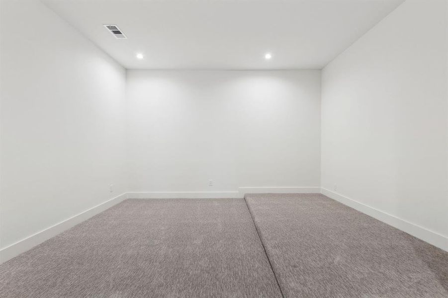 Unfurnished room featuring carpet