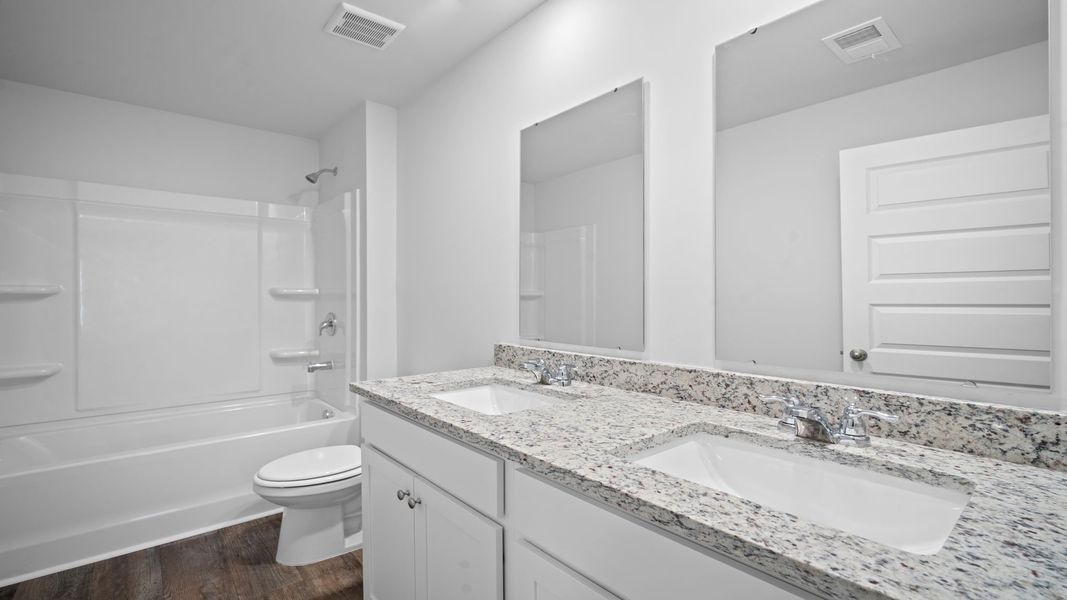 Furnished interior view inside a new home in The Groves at Bees Creek, Ridgeland (Image 33).