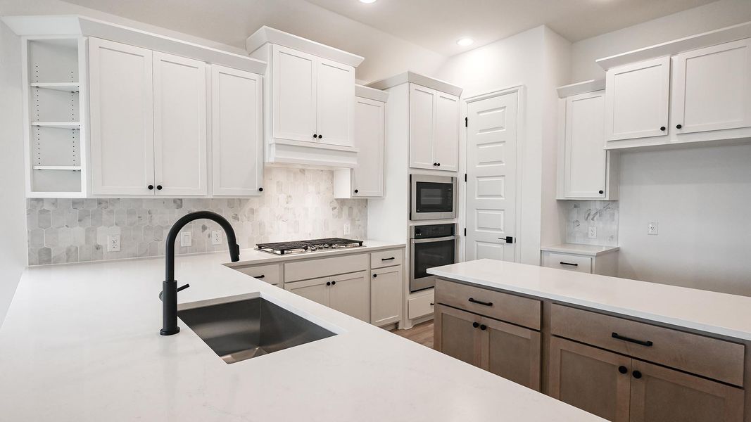 Furnished interior view inside a new home in 6 Creeks, Kyle (Image 5).