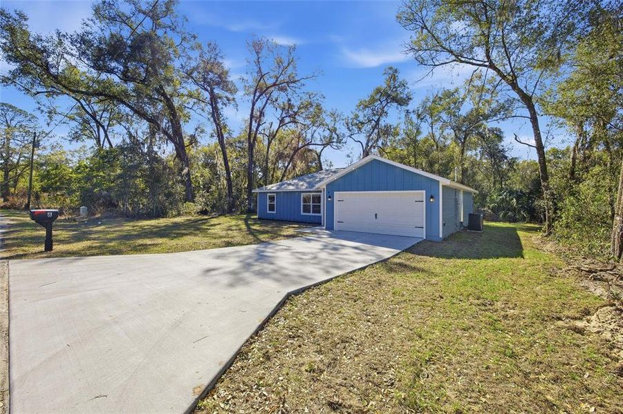 Front exterior of a new home in , Ocala, FL, highlighting curb appeal (Image 21).