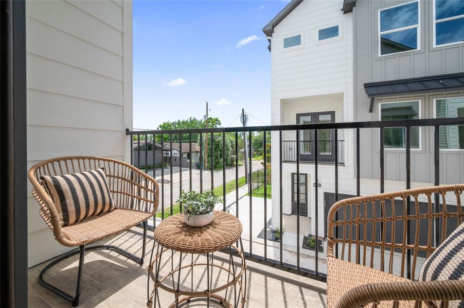 A private balcony offers the perfect spot for morning coffee, evening wine, or a quiet moment above the neighborhood.