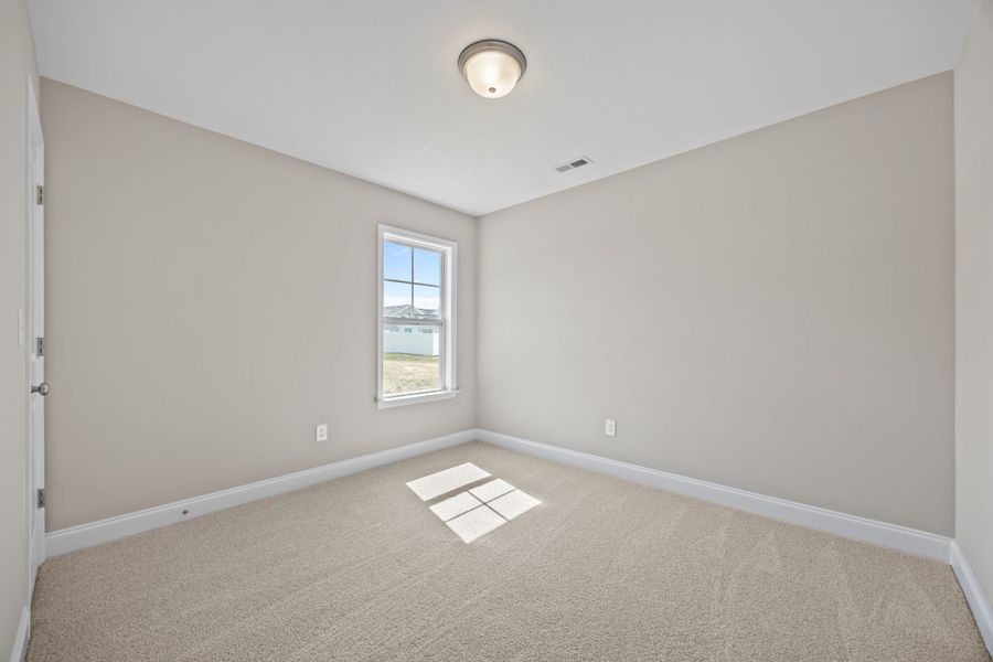 Spacious, unfurnished interior of a new home in Davenport Farms, Winterville (Image 32).