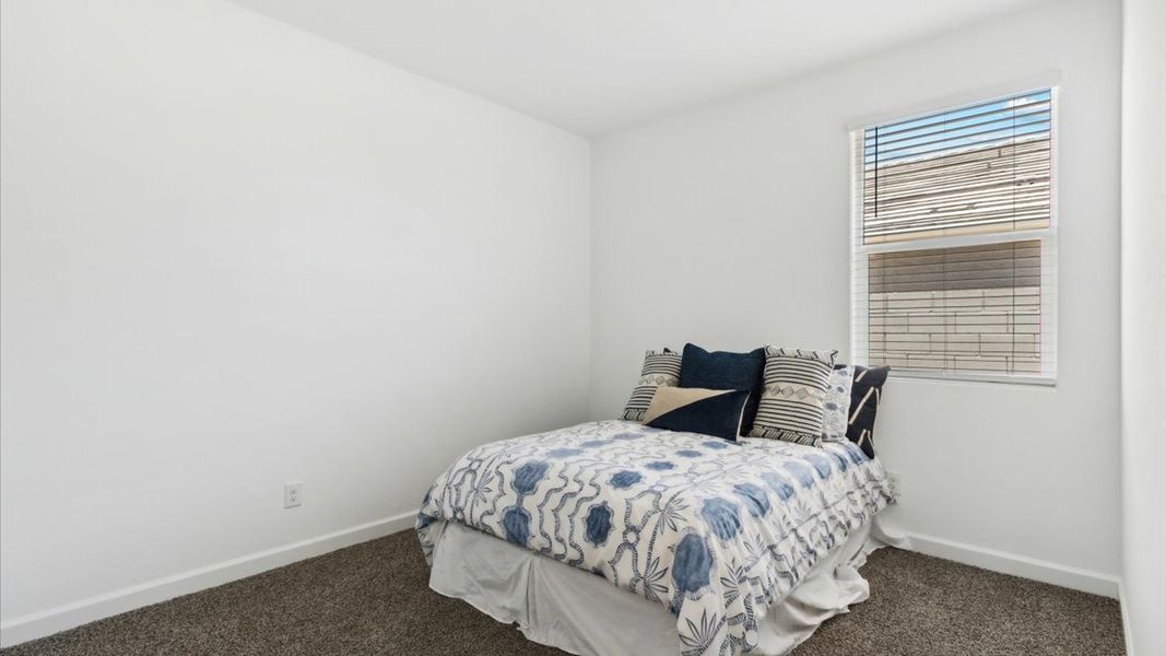 Representative furnished interior of a home built from the Justin by D.R. Horton in Sorrento, Maricopa (Image 28).
