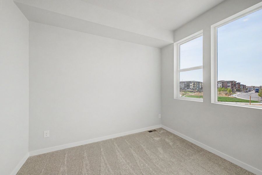 Spacious, unfurnished interior of a new home in Painted Prairie, Aurora (Image 30).