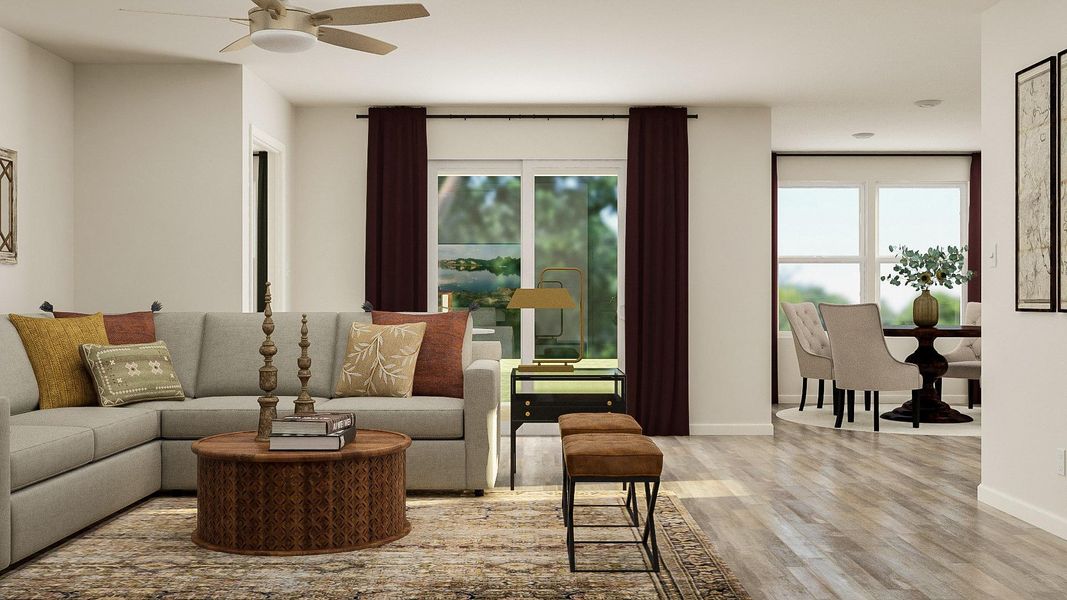 A living room with a couch and chairs. A living room with a couch and chairs.