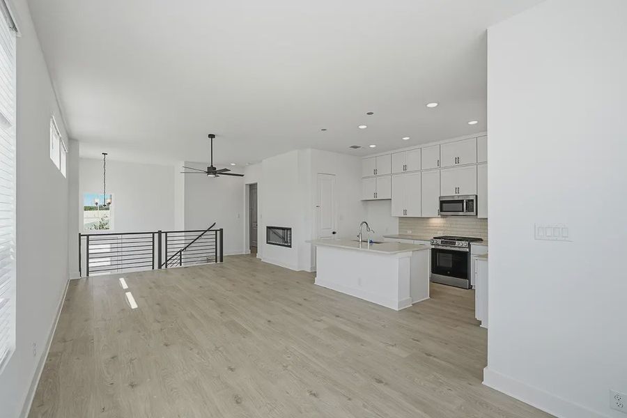Furnished interior view inside a new home in Prominence Urban, San Antonio (Image 11).