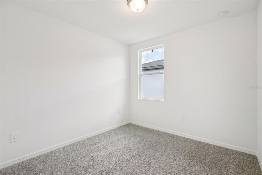 Spacious, unfurnished interior of a new home in Villamar - Classic Series, Winter Haven (Image 23).