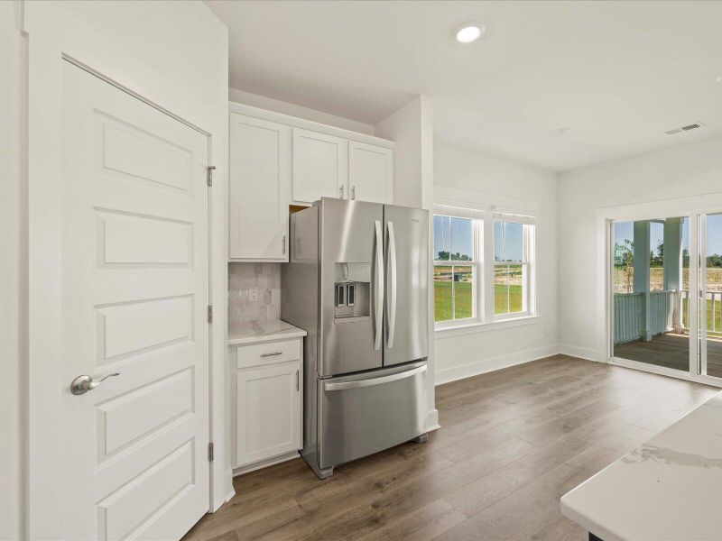 Furnished interior view inside a new home in The Coves at Lakes of Cane Bay, Summerville (Image 14). Furnished interior view inside a new home in The Coves at Lakes of Cane Bay, Summerville (Image 14).