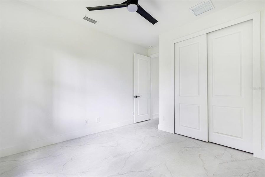 Spacious, unfurnished interior of a new home in , Port Charlotte (Image 32).