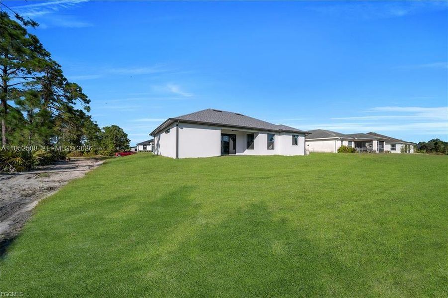 Exterior details and patio area of a home in , Lehigh Acres (Image 28).