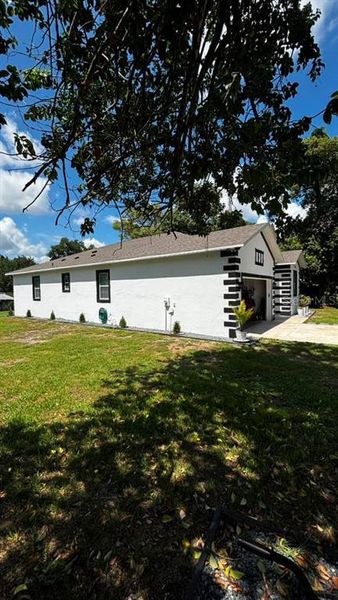 Exterior details and patio area of a home in , Dade City (Image 23).
