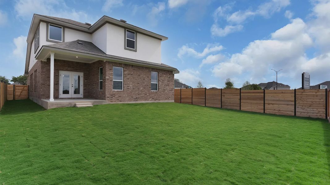 Exterior details and patio area of a home in Lariat, Liberty Hill (Image 14). Exterior details and patio area of a home in Lariat, Liberty Hill (Image 14).