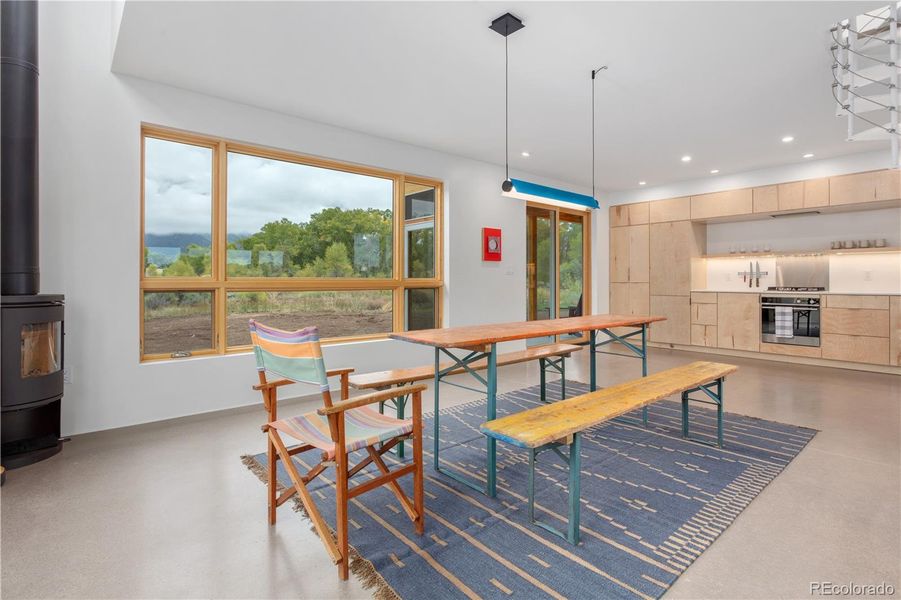 Modern woodburning stove for ambiance and alternative heat source.