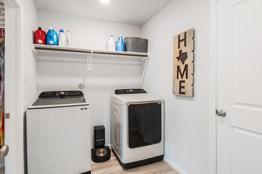 the utility room has access from the kitchen as well as access from the primary walk-in closet! the utility room has access from the kitchen as well as access from the primary walk-in closet!