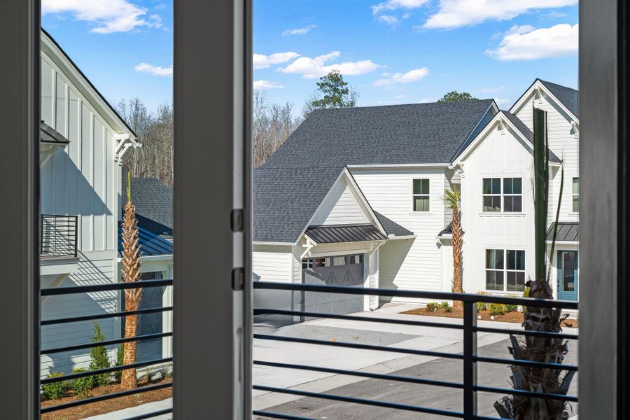 Exterior details and patio area of a home in , Johns Island (Image 23).
