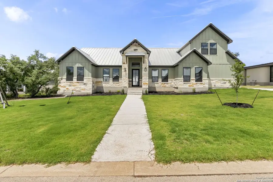Front exterior of a new home in , Wimberley, TX, highlighting curb appeal (Image 1). Front exterior of a new home in , Wimberley, TX, highlighting curb appeal (Image 1).