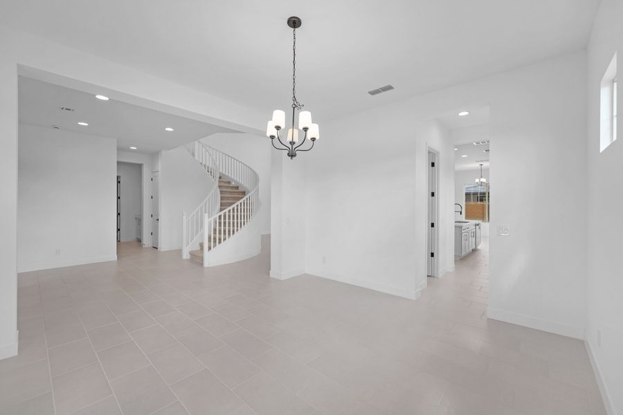 Spacious, unfurnished interior of a new home in Ellsworth Ranch Voyage Collection, Queen Creek (Image 13).