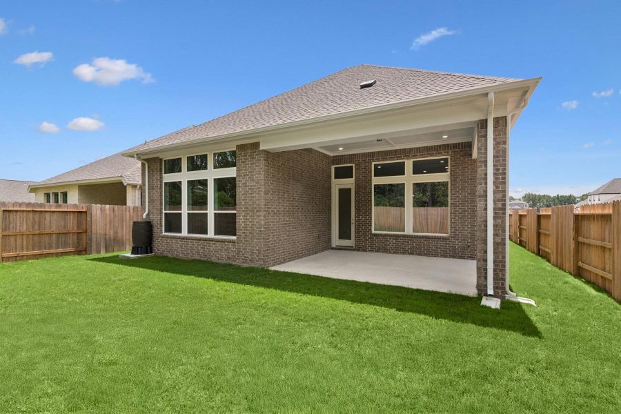 Exterior details and patio area of a home in ARTAVIA 45' Homesites, Conroe (Image 3).