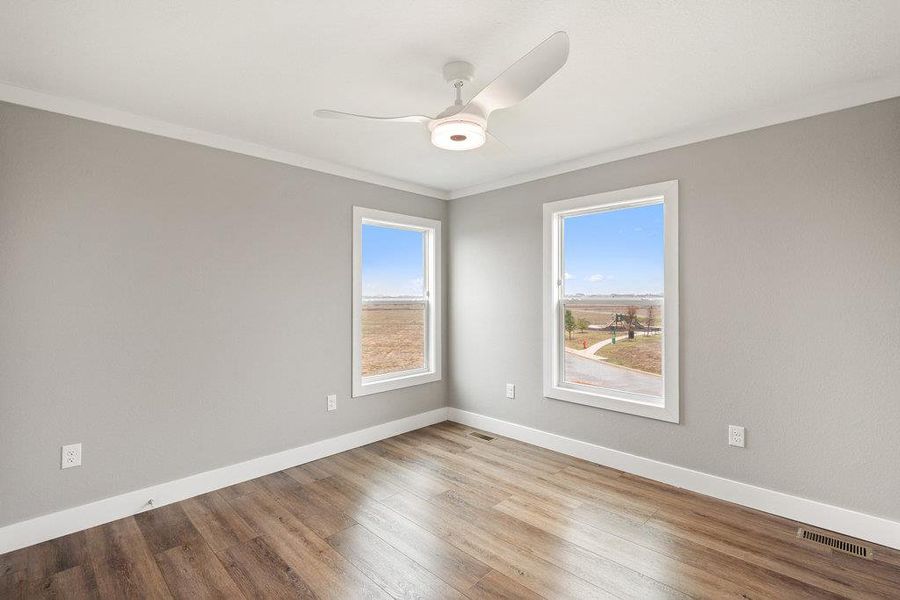 one of two secondary bedrooms upstairs