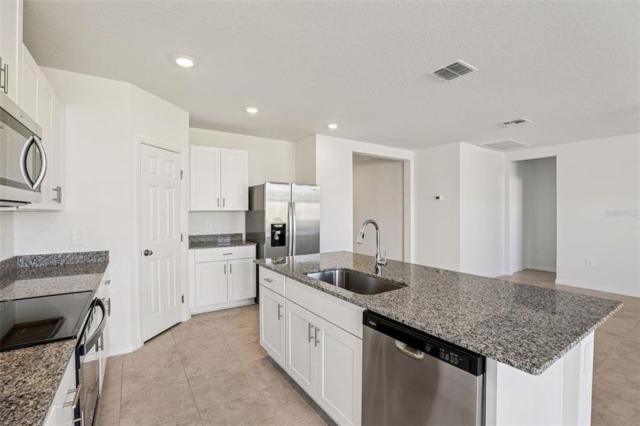 Furnished interior view inside a new home in Lawson Dunes - Signature Series, Haines City (Image 8). Furnished interior view inside a new home in Lawson Dunes - Signature Series, Haines City (Image 8).