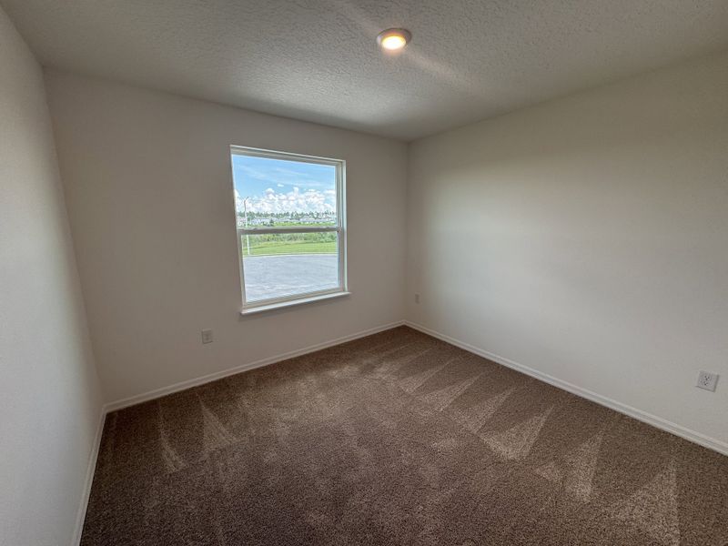 Spacious, unfurnished interior of a new home in Lake Deer Estates, Poinciana (Image 12).