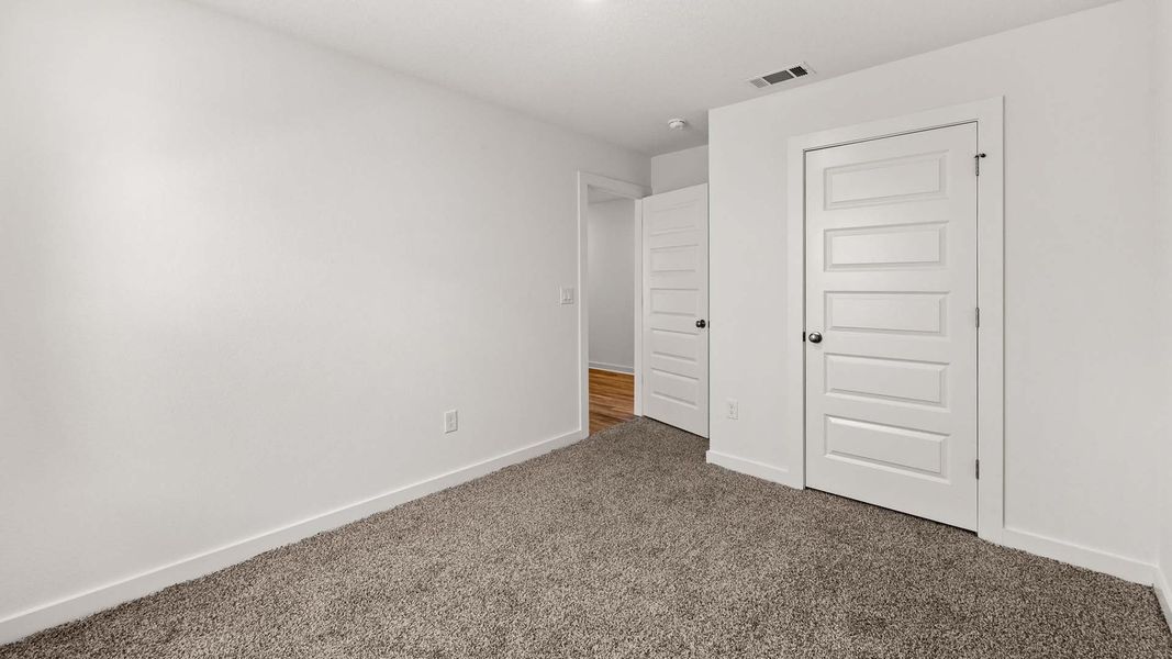 Spacious, unfurnished interior of a new home in Magnolia at the Bluffs Phase 3, Freeport (Image 21).