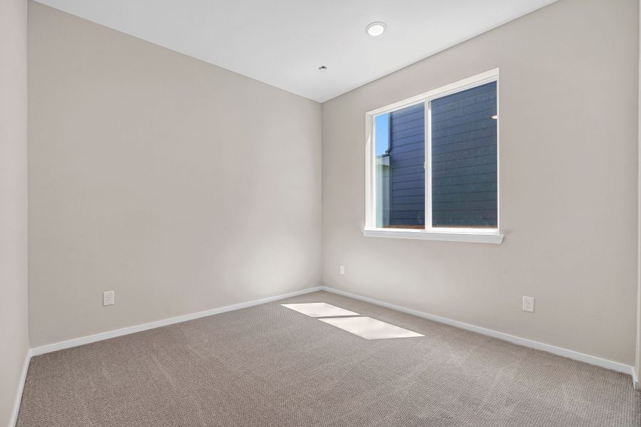 Spacious, unfurnished interior of a new home in Barefoot Village, Firestone (Image 11).