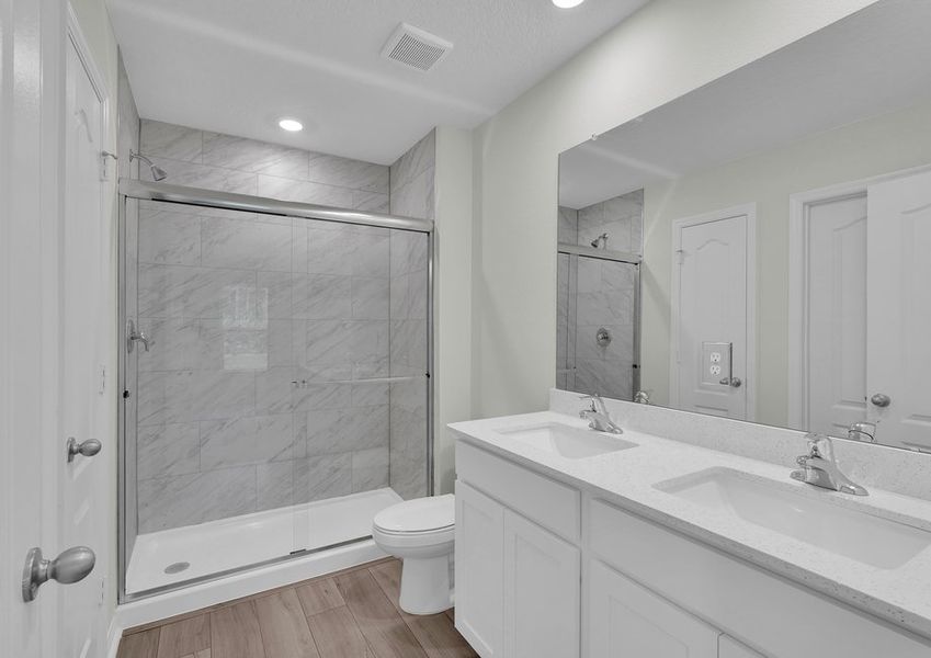 Get ready for your day in the Pecan's master bathroom