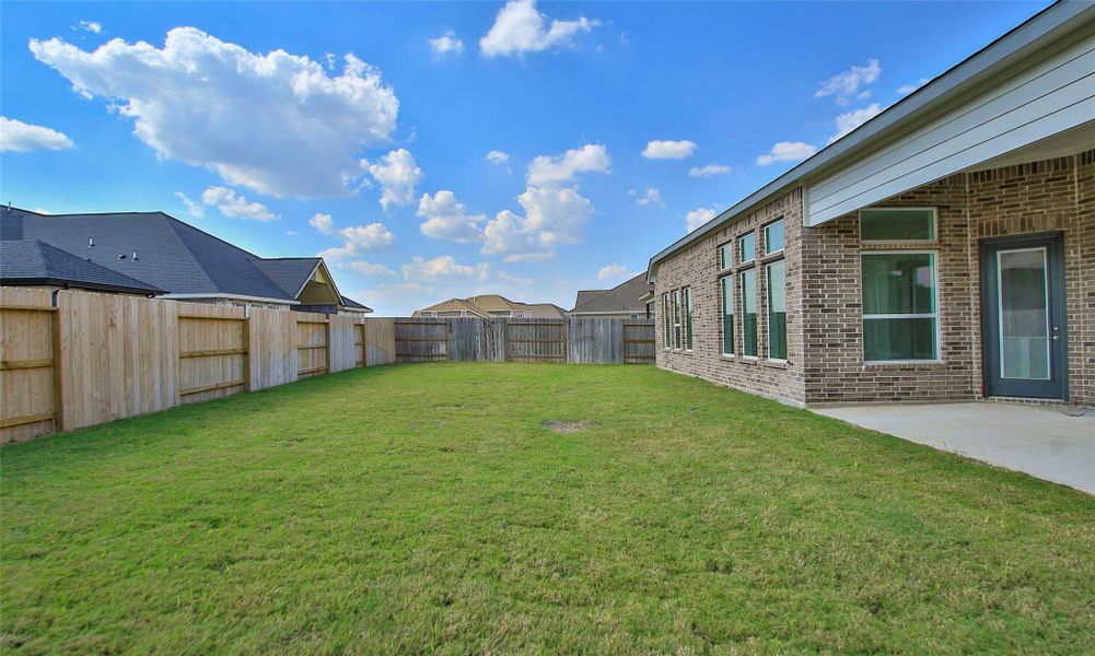 Exterior details and patio area of a home in Brookewater, Rosenberg (Image 15). Exterior details and patio area of a home in Brookewater, Rosenberg (Image 15).