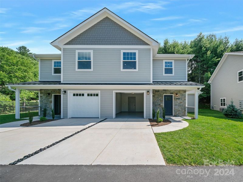 Each townhome has concrete space for additional car parking and over flow graveled spaces off pavement for additional overflow parking Each townhome has concrete space for additional car parking and over flow graveled spaces off pavement for additional overflow parking