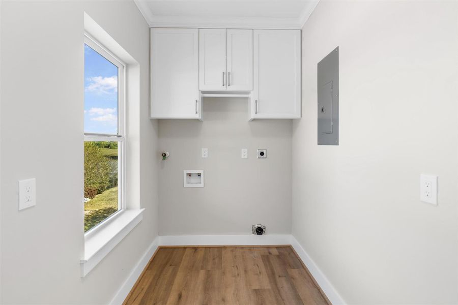 Laundry room with overhead storage Laundry room with overhead storage